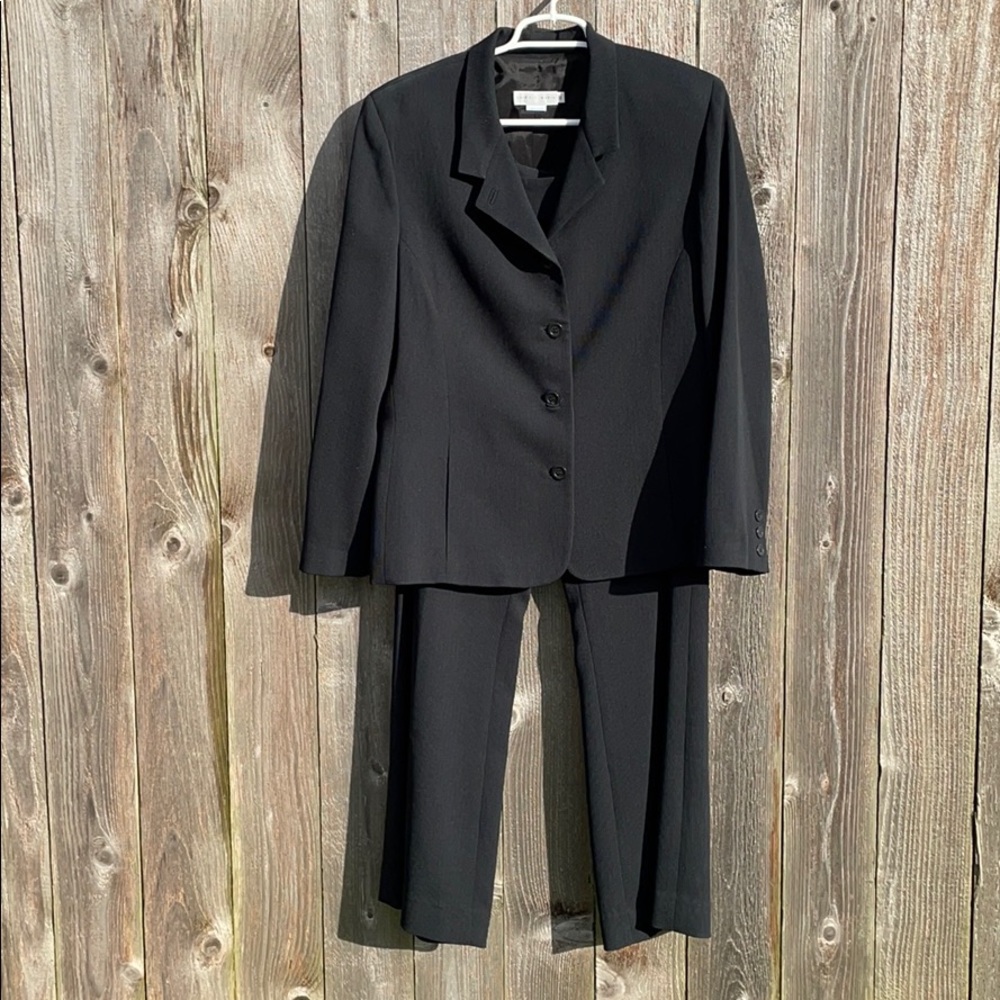Like New size 14/16 2 piece black suit